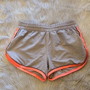 Under Armour heat gear womens gray and neon‎ pink althetic shorts size xs